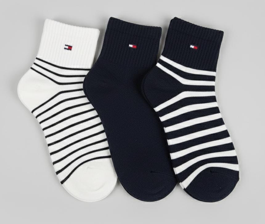 TOMMY H. CALETINES MUJER DE RAYAS 3